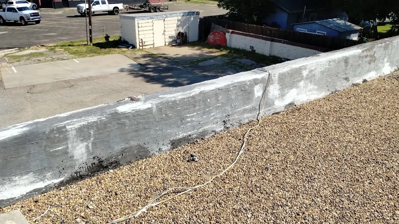 Commercial flat gravel roof with concrete parapet — 5 Star Roofing TPO and built-up systems