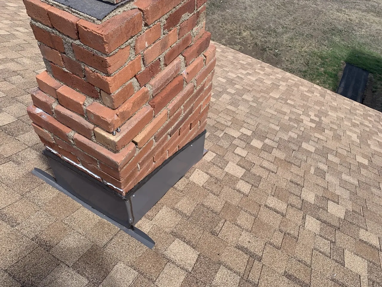 White TPO commercial roofing membrane on flat-roof building in Pampa TX
