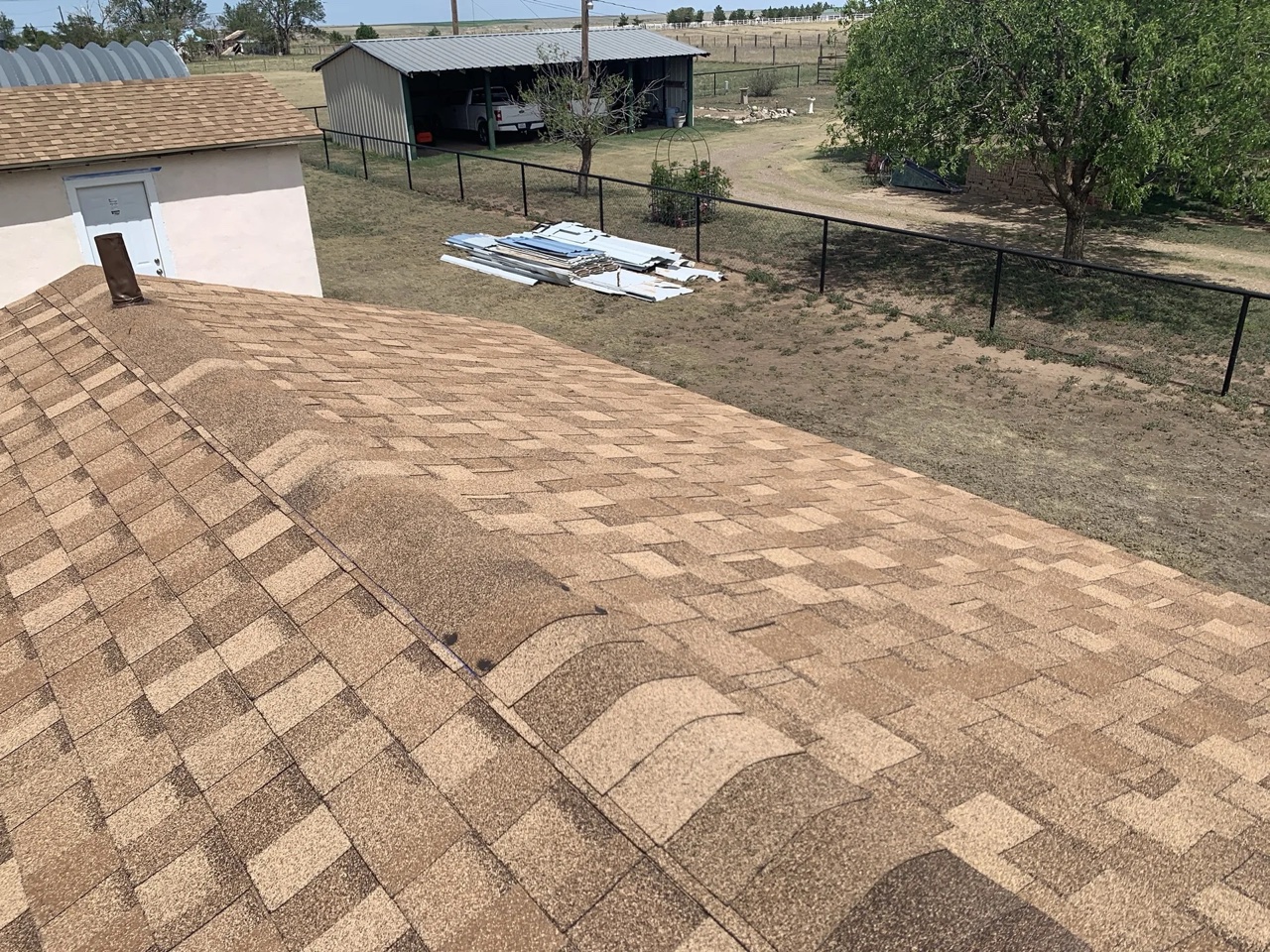 New roof installed after hail damage near Channing TX - Impact-resistant shingles