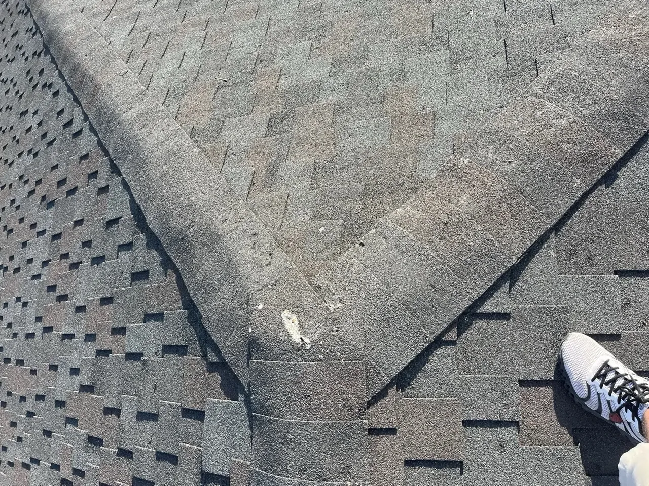 Storm damage assessment on a Canyon, Texas roof after severe hail event