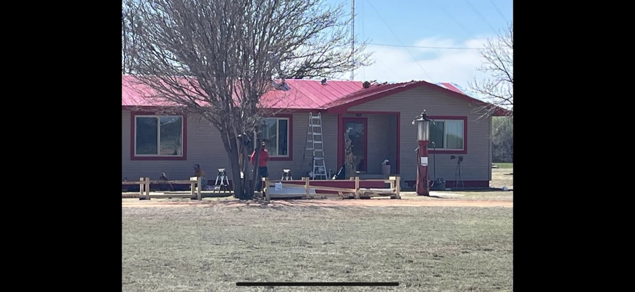 Completed r-panel metal roof in Memphis, TX by 5 Star Roofing
