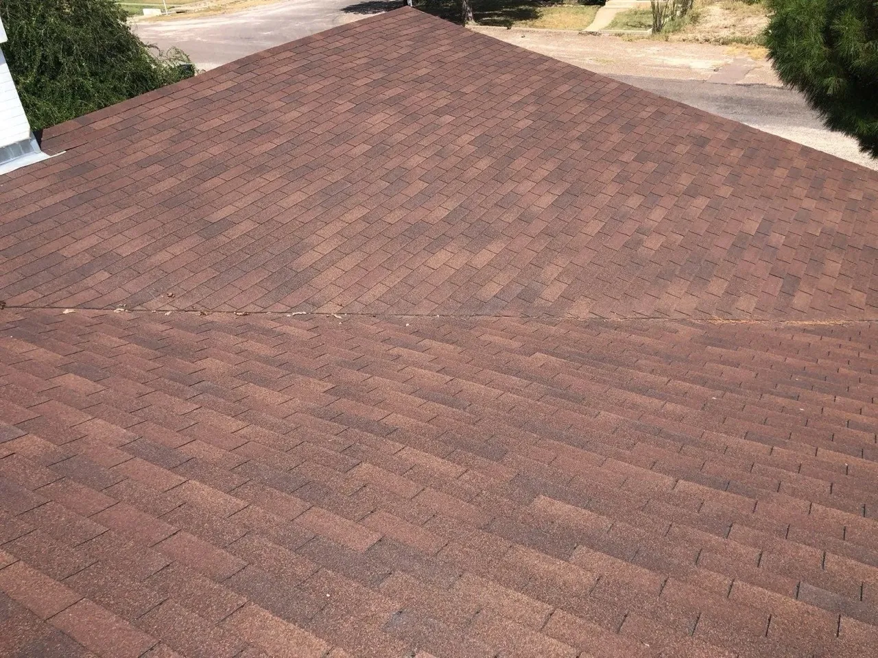 Standing seam metal roof installation in progress in Sanderson, West Texas